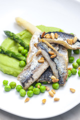 herring with green asparagus and peas