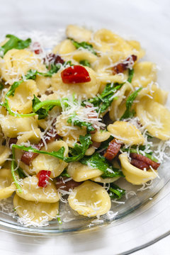 pasta orecchiette with ruccola and bacon