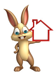 cute Bunny cartoon character with home sign