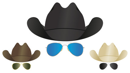 A selection of country and western cowboy hats and aviator sunglasses.
