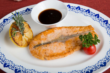 Salmon steak with sauce