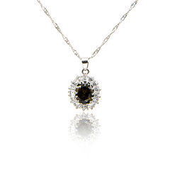 Black spinel Diamond pendant isolated on white
