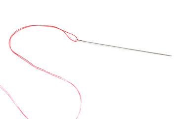 Obraz premium Small needle with thread isolated over the white background