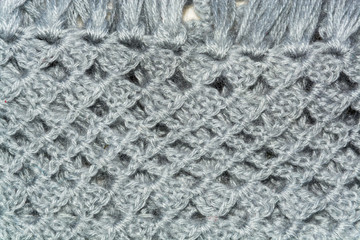texture of gray knitted hook openwork fabric