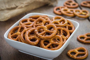 Salted pretzel in bowl