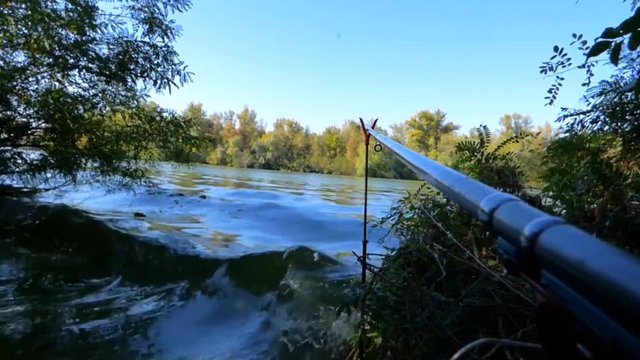Dnepr River. Early morning. Fishing. Big waves beating against the shore