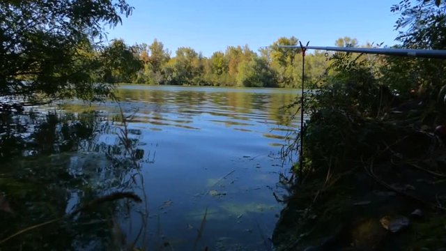 Dnepr River. Early morning. Fishing. Small waves rolled ashore