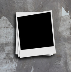 White paper picture frame on the grunge wall