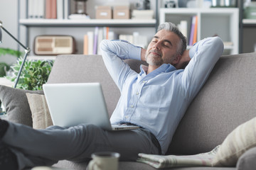 Man relaxing at home