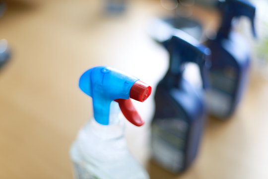 Spray bottle of disinfectant household cleaners.