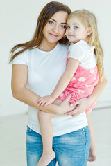 mother with daughter  on the floor 