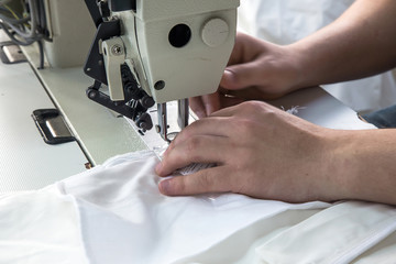 Industrial sewing machines with sewing machine operator