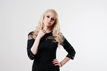 Close up studio portrait of  blonde girl in black dress