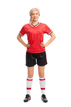 Female soccer player in a red jersey