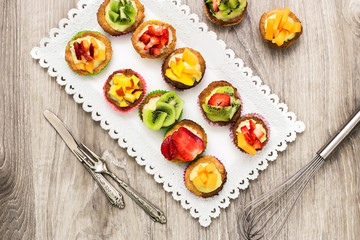 top vie of mini pastry with custard cream and fresh fruits