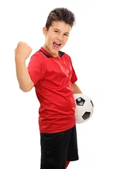 Türaufkleber Junior football player with gripped fist © Ljupco Smokovski