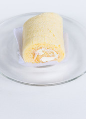 Soft roll cake with the glass plate
