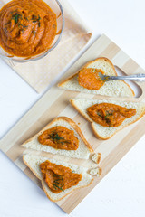 Toasted eggplant caviar on white wooden background