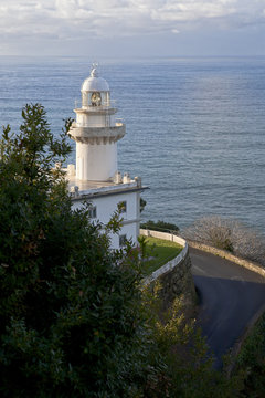 San Sebastian. Lighthouse on beside the road to Monte Igueldo. Faro del Monte Igueldo.

