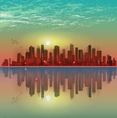 Fototapeta na wymiar Modern night city skyline in moonlight or sunset, with reflection in water and cloudy sky 