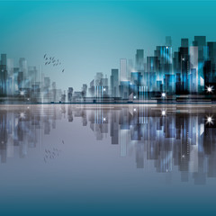 Modern night city, with reflection on water surface