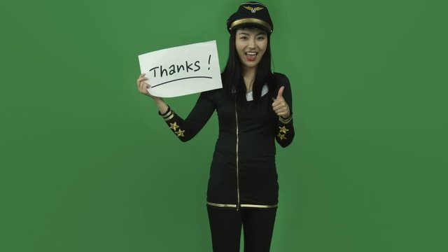 Asian air hostess  isolated greenscreen green background grateful thanks sign