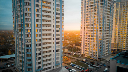 sunset at living blocks with high modern buildings