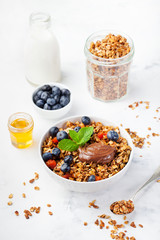 Fresh granola with chocolate hazelnut spread