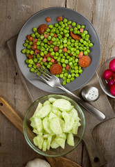 vertical take dish cooked with ham and chorizo peas in old woode