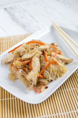 Chapchae - Asian dish of glass noodles with chicken and vegetabl