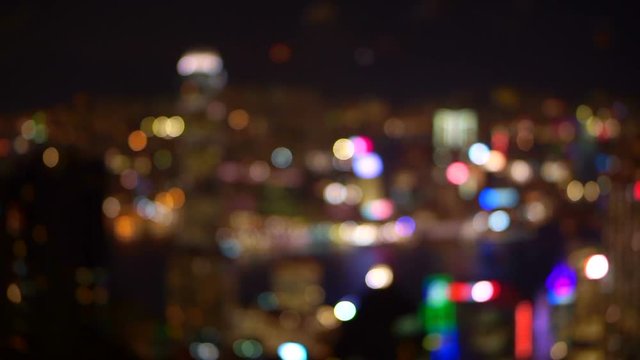 Blur background view of World famous skyline Hong Kong harbour at night. Tourist landmark popular view