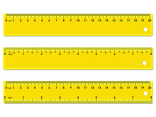 Set of three yellow rulers, marked in centimeters, inches and combined, rectangular shape. Graduation of inches ruler of 1/16