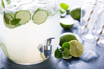 Lime and cucumber lemonade in dispencer