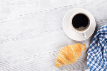 Fresh croissant and coffee
