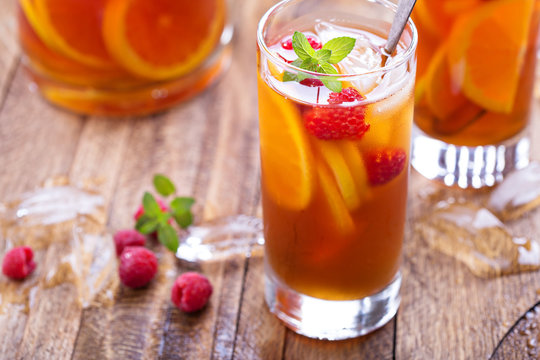 Iced tea with orange and raspberry