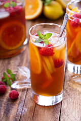 Iced tea with orange and raspberry