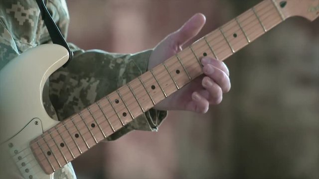 Guitarist fingers Playing