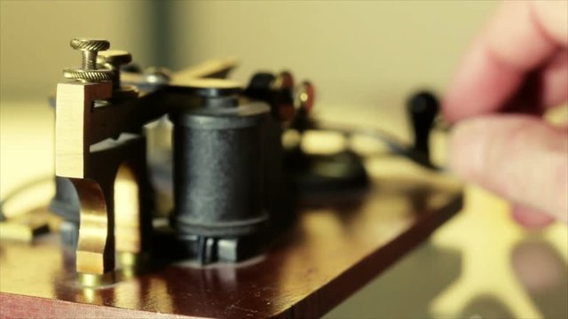 shallow DOF of a telegraph sending morse code