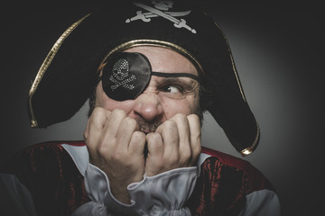 Fear pirate with eye patch and old hat with funny faces and expr
