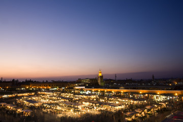 Fototapeta na wymiar Morocco. Marrakech. The Jemaa el-Fna Square at sunset. Blurred motion in the foreground