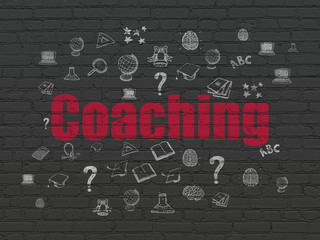 Education concept: Coaching on wall background