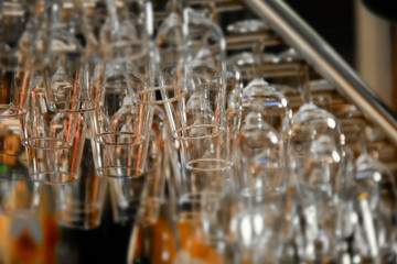 macro detail of glasses in a bar