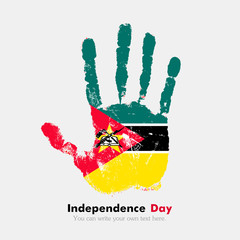 Handprint with the flag of Mozambique in grunge style