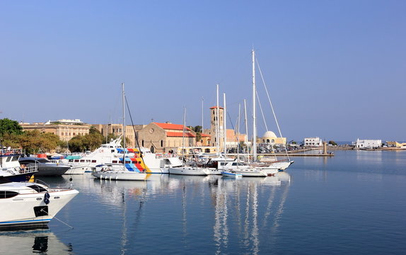 The Mandraki harbor in Rhodes town, Greece.