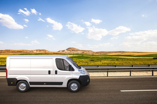 White Delivery Van On The Road With Colorful Background