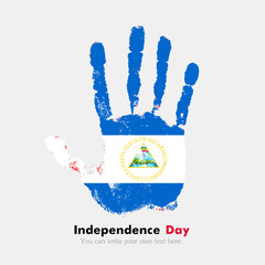 Handprint with the Flag of Nicaragua in grunge style