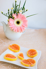 Fototapeta na wymiar Plate with marmalade on the table