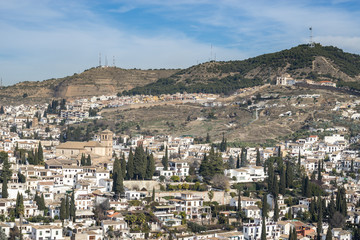 Obraz premium Ancient city of Granada. Central District Albayzin. View from the Alhambra, Andalusia, Spain