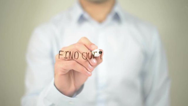 Find Out More , man writing on transparent screen