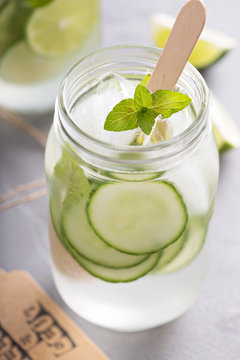 Lime and cucumber lemonade in mason jars